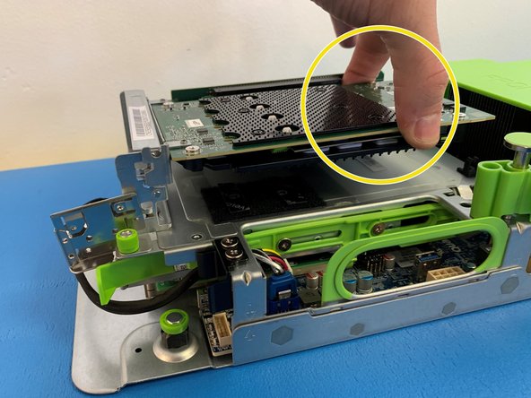 Grasp the AVA M.2 carrier card by the edges and gently pull it out of PCIe Riser card socket.