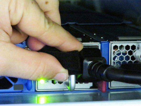 Connect the AC cable to the PSU.