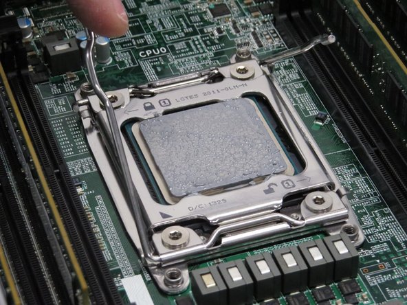 Release the left CPU retention lever.