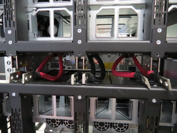 Continue disconnecting the left and right lug cables.