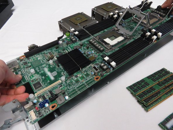 Remove the packaging from the new motherboard.