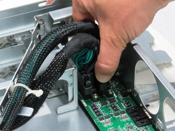 Pull the cable upwards.