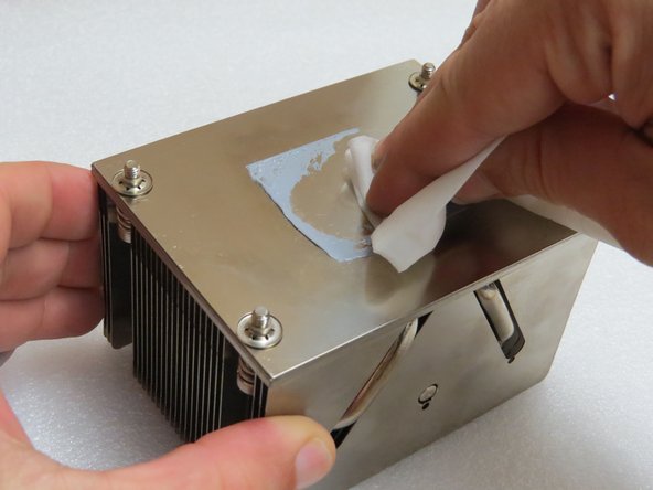 Completely remove thermal compound from both CPUs and heatsinks.