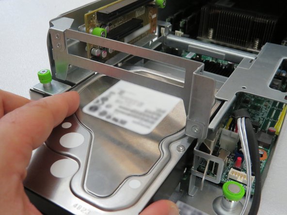 Retention tab will 'click' when the HDD has seated properly.