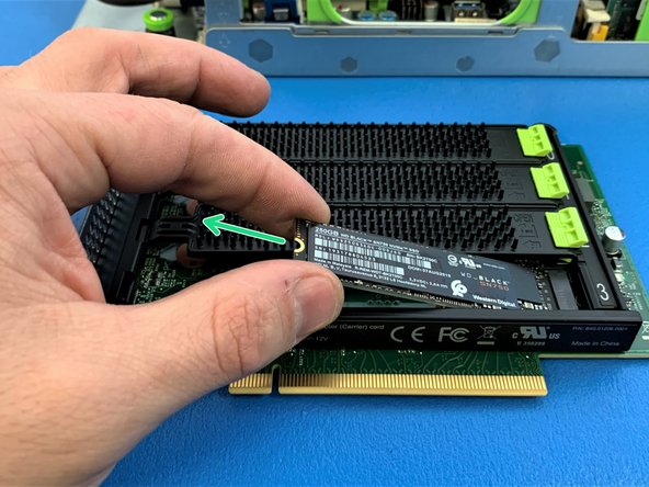 Gently pull out the SSD out of the socket.