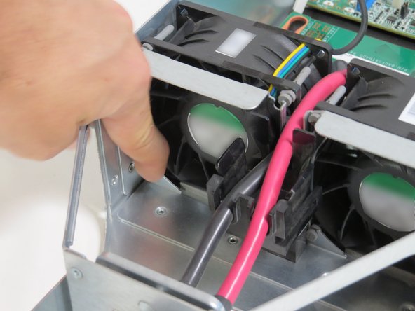 Secure all (4) fan grommets into their respective slots.