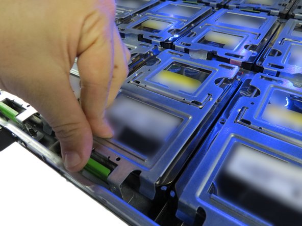 Close the and secure the HDD tray gate.