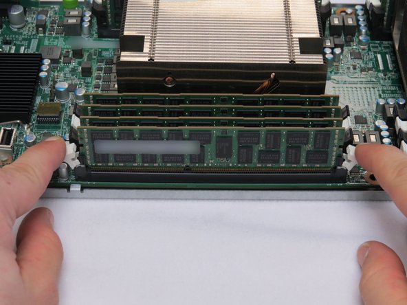 Lift the DIMM from the socket.