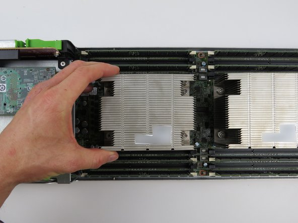 Lift the heatsink from the CPU socket.