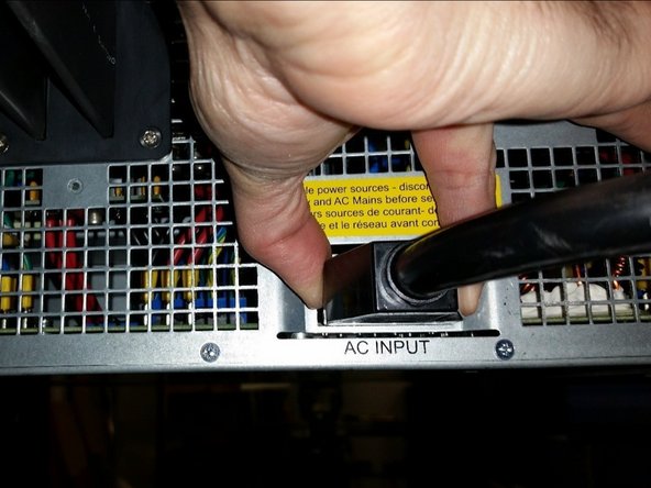 Depress the sides of the connector since there are latches holding the connector into the power shelf.