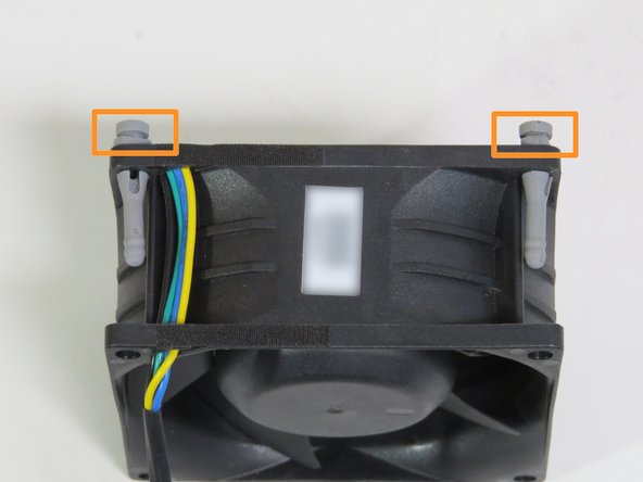 Align (4) fan rubber grommets (2 as shown), with (4) chassis fan grommet slots.