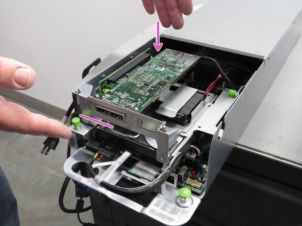 Engage the riser cage, as shown.