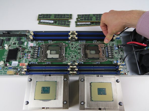 Close (2) CPU retention brackets.