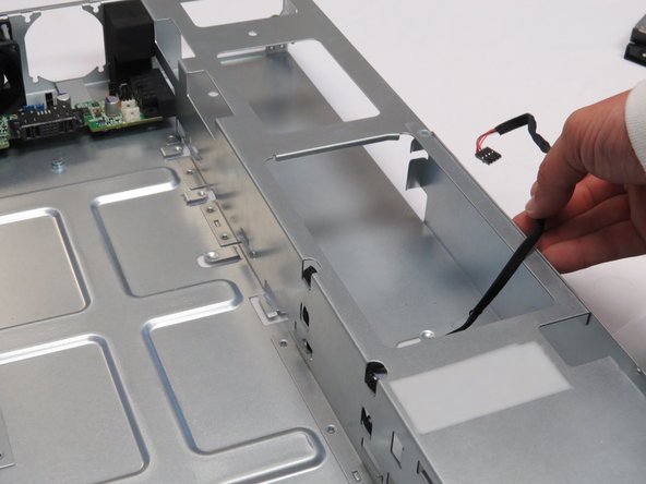 Place the LED cable on the side of the chassis.