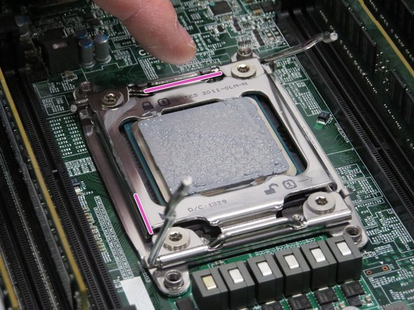 Engage the CPU bracket, as shown.