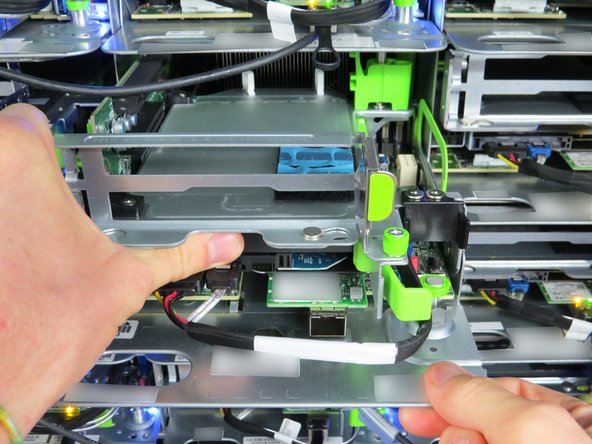 The retention tab will 'click' when the HDD has seated properly.