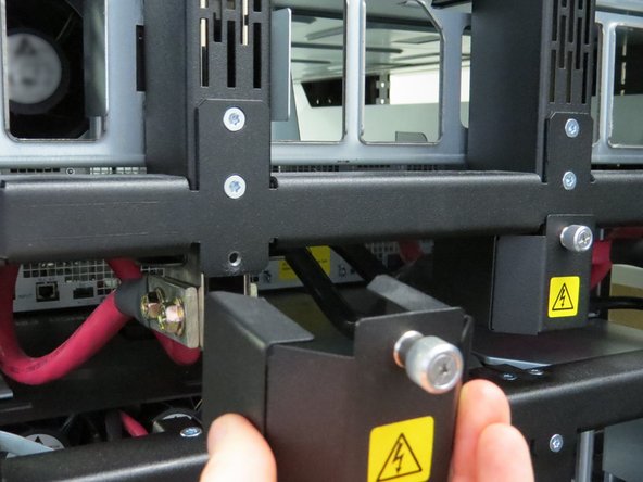 Remove the bus bar lead covers.