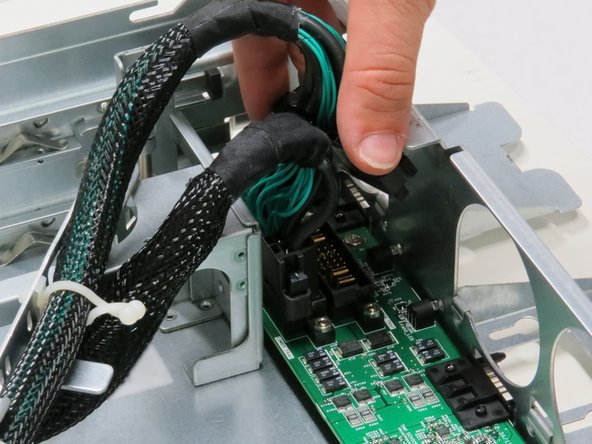 Pull the cable upwards.