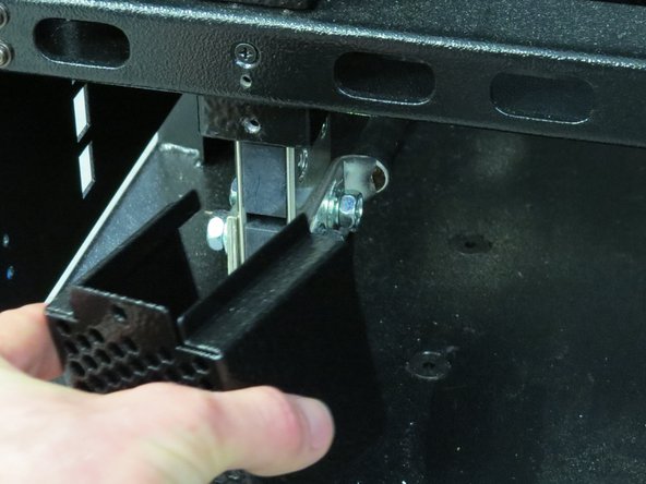 Make sure there is not live power on the bus bars before proceeding with this step.