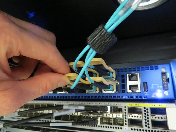 Disconnect the QSFP uplink cables.