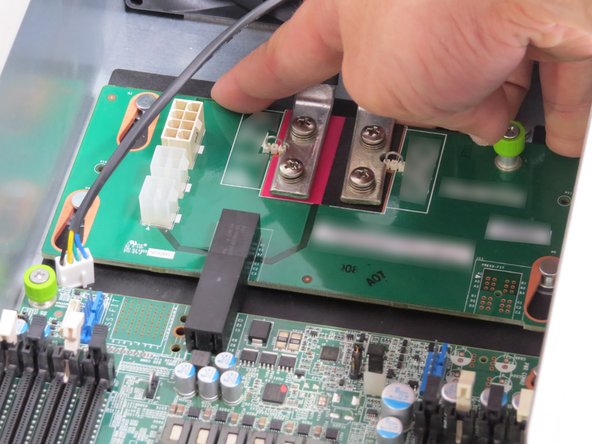 Loosen the midplane thumbscrew.