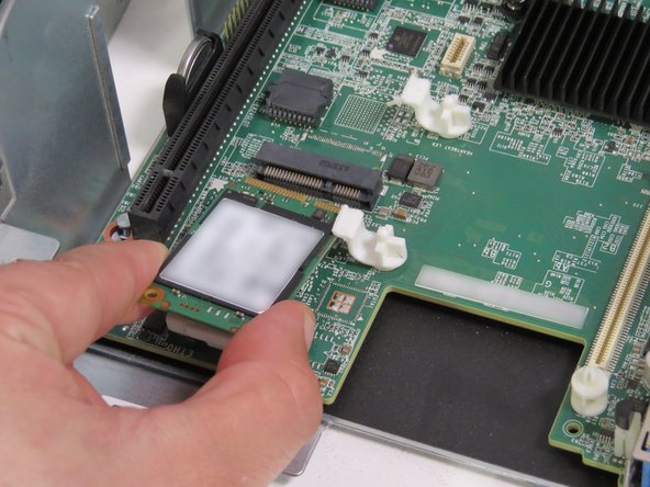 Place the mSATA drive on the work bench. It will be installed at a later point.