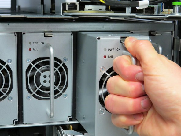 Remove all of the power supplies and place aside for later installation.