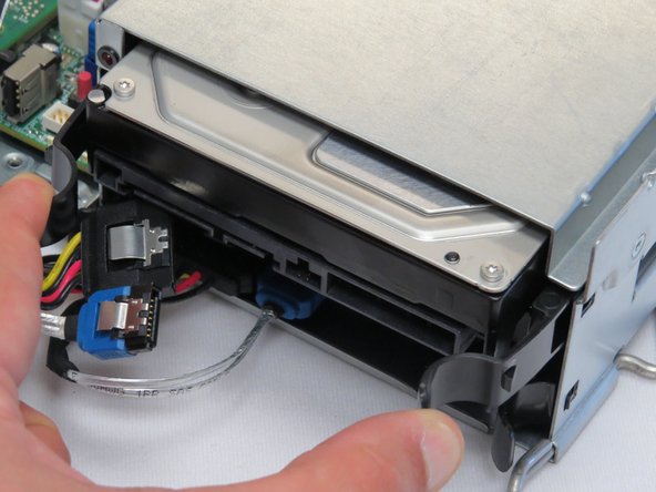 Pull the HDD away from the chassis.