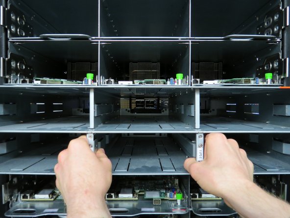 Slide the empty power shelf out from the rack (as shown).