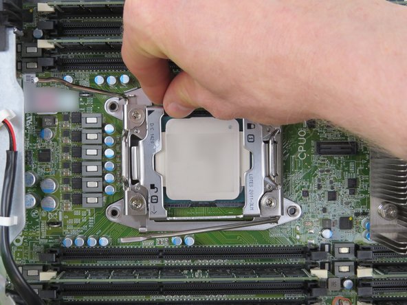 Ensure the 'lock' CPU retention lever is on top of the CPU retention gate lip.