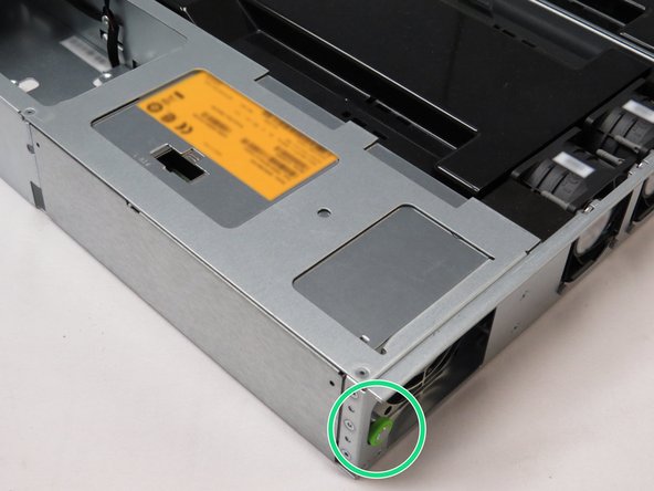Pull the retention plunger away from the PSU.