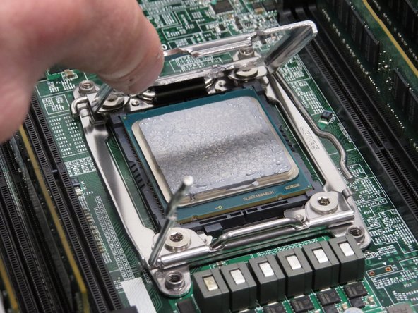 Rotate the CPU bracket towards the middle of the server.