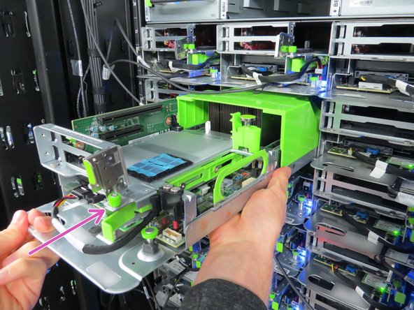 Insert the server sled into the rack as shown.