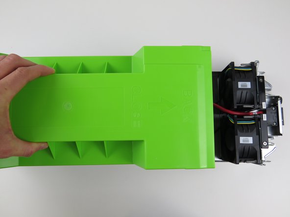 Insert the lid onto the server chassis.