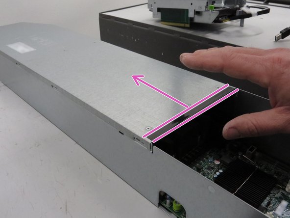 Engage the server lid, as shown.