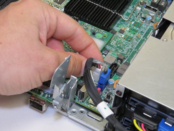 Connect the SATA / power cable to the server motherboard.