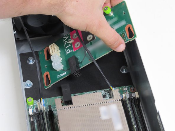 Lift the board towards the right and up from the server.