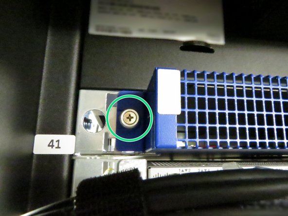 Loosen the two thumbscrews located on each side side of the switch.