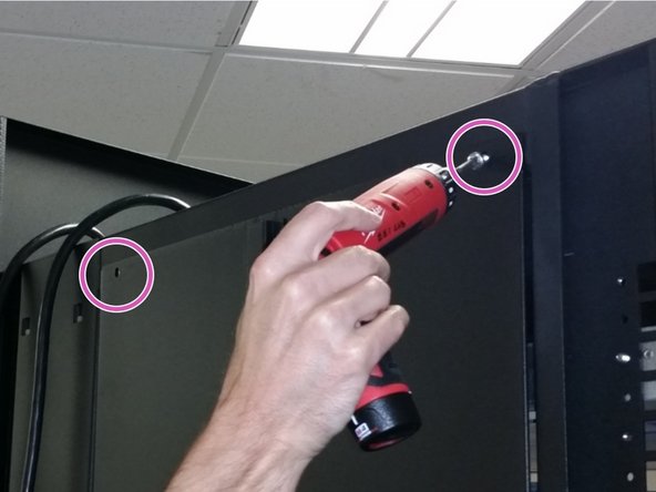 Install (2) M6 screws that come with the side panel into the top two locations.