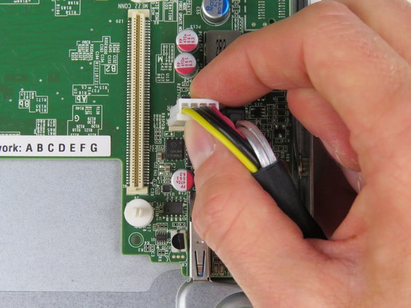 Insert the Power cable into the it's socket until resistance is felt.