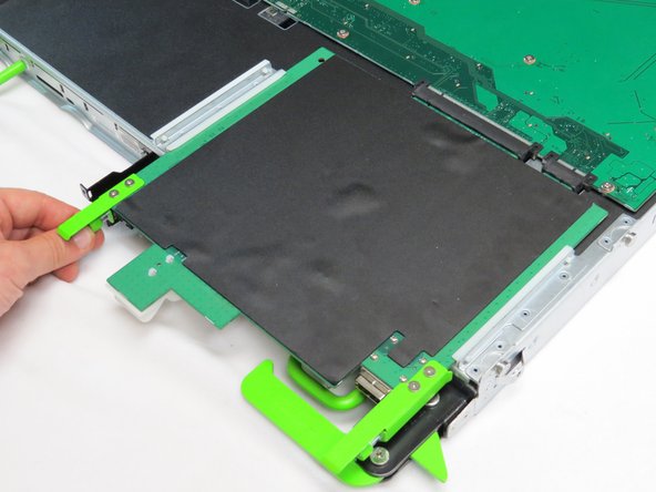 Loosen one thumbscrew.