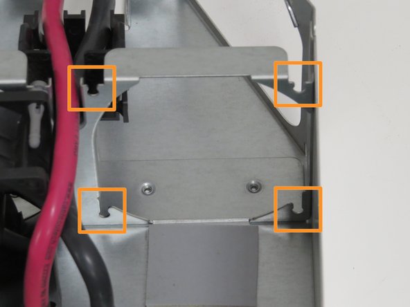 Align (4) fan rubber grommets (2 as shown), with (4) chassis fan grommet slots.