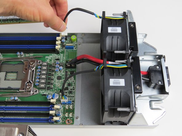 Disconnect (2) fan power cables.