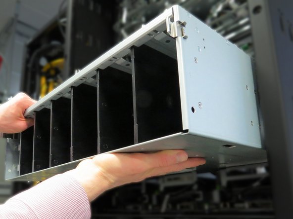 Insert the shelf into the rack.