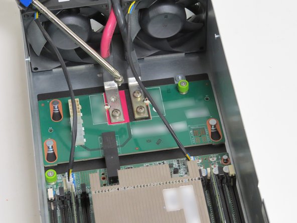 These screws secure the bus bar server power leads.