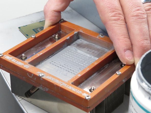 Apply thermal compound, as shown.