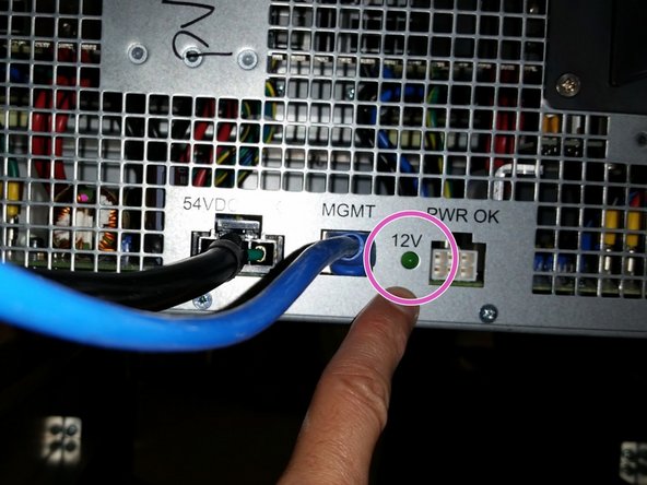 Ensure that the green LED on the rear of the power shelf is not illuminated. A lit LED indicates 12V power from the bus bar.