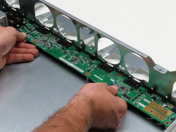 Pull the fan control board horizontally towards the front of the chassis about 2cm.