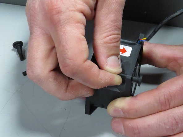 When the grommet cannot be inserted any further, pull the remainder of the rubber grommet through.