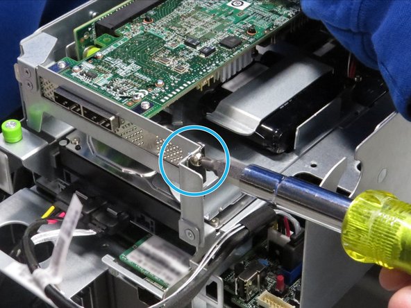 Remove the the screw from the RAID controller bracket with a  Phillips #2 screwdriver.